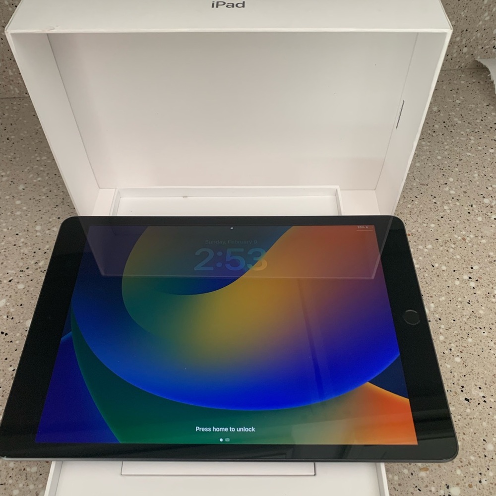 IPad 9th Generation 64 GB Wi-Fi + Cellular. No charger included. Still in box.